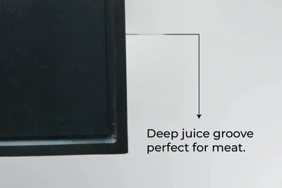 Close-up of the deep juice groove on a Black PolySlice BBQ HDPE Plate, perfect for resting meat and keeping surfaces clean.