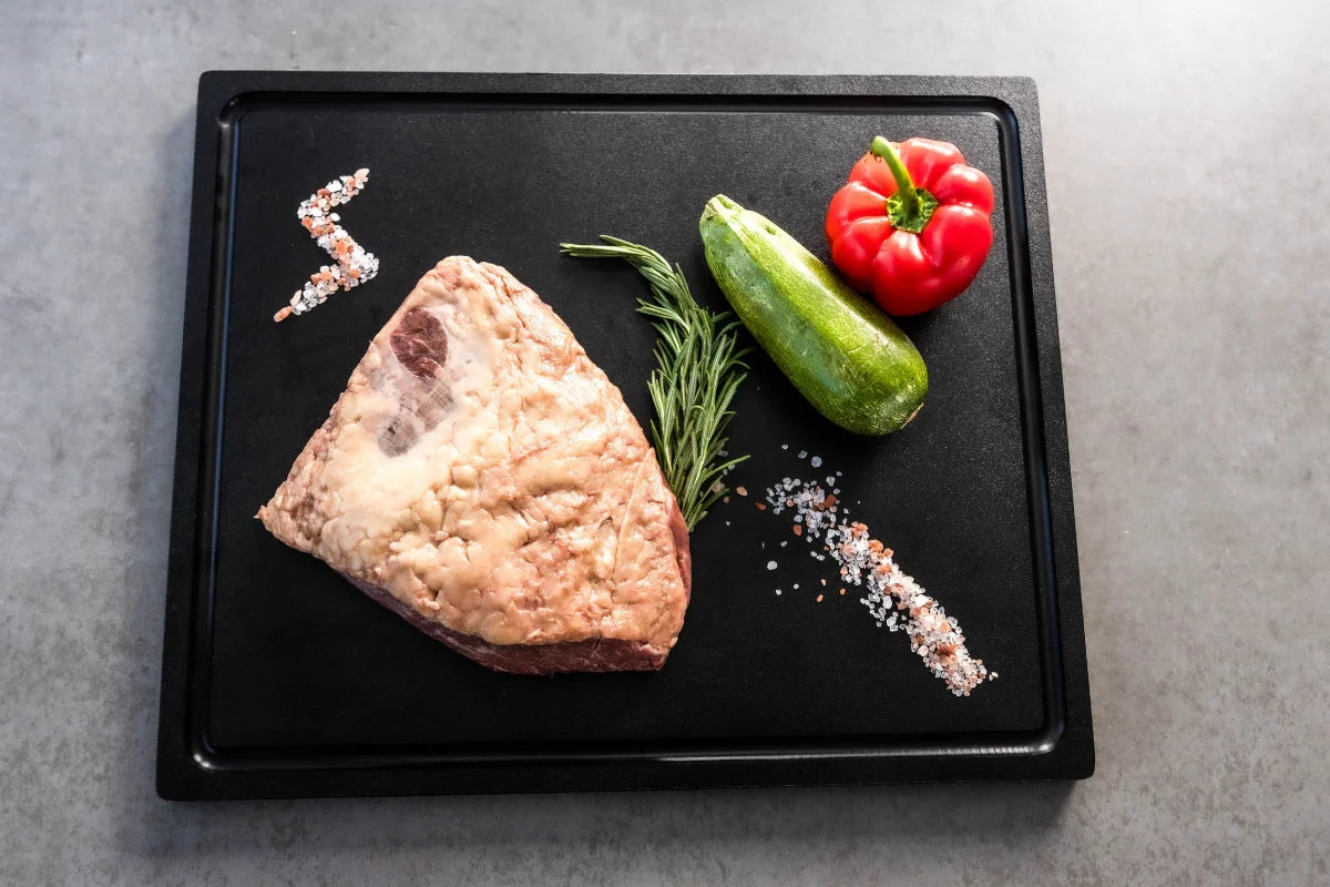 Preparing raw ingredients on a durable Black cutting board